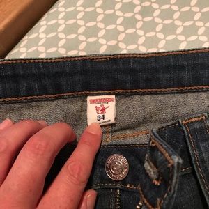 Women’s True Religion skinny jeans.